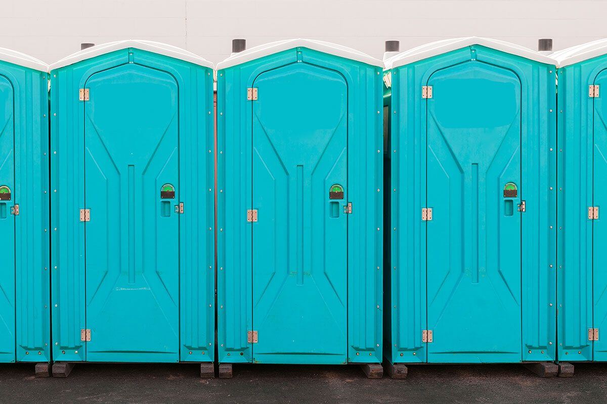 Industrial portable restroom units at a plant in Freeport, Illinois